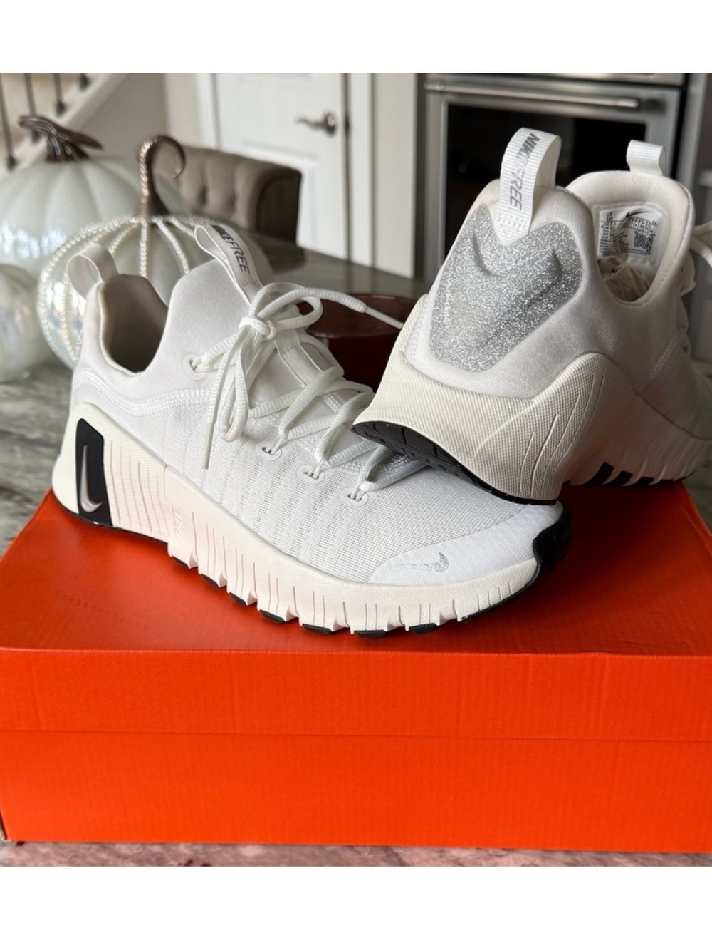 Nike Women’s White and Silver Sneakers
